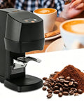 58 Millimeter Automatic Espresso Tamper Featuring Adjustable Depth And Steady Pressure Settings Slash Shot Prep Time And Kill Uneven Extractions Perfect For Fast Paced Coffee Shops And Lazy Sundays At Home on a countertop with coffee beans.