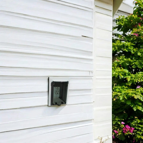 DBVC-1 Clear Vertical Replacement Cover For Arlington Recessed Outlet Boxes Weatherproof Bubble Style Shield on white siding