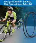 2 Pack 700x28c Road Bike Tire Replacement Kit With Inner Tubes, shown with cyclist on city road.