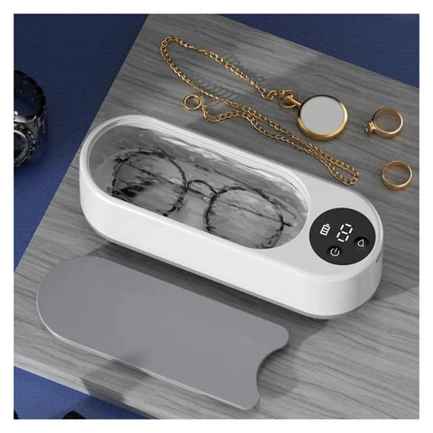 This Slick Little Ultrasonic Cleaner Machine Packs A Serious Punch With A Roomy 300 ML Tank, cleaning glasses, rings, and jewelry.