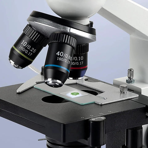 Microscope with 100 Count Square Cover Glass Microscope Slides Kit with crystal clear glass, ideal for detailed observations.