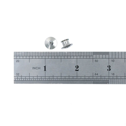 Locking Pin Backs Set 30 Pieces With Storage Case For Jewelry Making Nickel Plated Copper Reusable Clip Clasps next to ruler