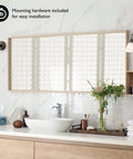 Millbridge Dimmable Vanity Light With Four Frosted Glass Shades In Oil Rubbed Bronze mounted above bathroom mirror