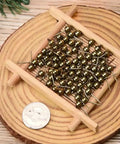 Antique Bronze Brass Round Ball Post Stud Earrings With Loop For Dangle Jewelry Making 100 Pcs Nickel Free 5mm Ball Size 16mm Long 1mm Pin 1mm Hole Solid And Versatile Craft Findings arranged on wood tray