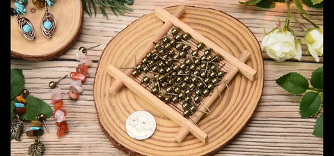 Antique Bronze Brass Round Ball Post Stud Earrings With Loop For Dangle Jewelry Making 100 Pcs Nickel Free 5mm Ball Size 16mm Long 1mm Pin 1mm Hole Solid And Versatile Craft Findings arranged on wood tray