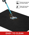 Oil Spill Mat For Garage Floor Absorbs Oil And Liquids With Waterproof Backing Keeps In Place Reusable Washable Heavy Duty 29 By 36 Inches Black And Orange To Protect Concrete From Stains shown being cleaned with vacuum