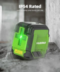 Self Leveling Laser Level With 60 Inch Tripod And 98 Feet Range Green Cross Line Laser Tool For Picture Hanging Home Reno And Indoor Projects Manual And Auto Level Modes Batteries And Carrying Bag Included, IP54 rated green laser on concrete surface.