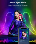 DJ using WiFi RGB Rope Lights with Music Sync, colorful LED strips creating vibrant backdrop, features smart control on phone screen. 