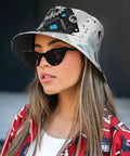 Fresh Lightweight Bucket Hat For Men And Women Featuring Dope All Over Print Polyester Twill Fabric worn by a woman with sunglasses.