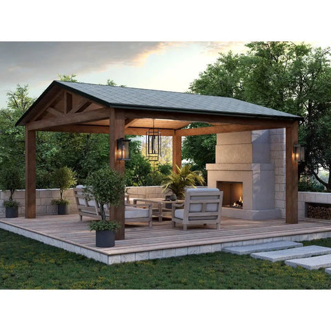 Barnett Outdoor One Light Wall Lantern In Antique Bronze Finish illuminating open patio with fireplace and seating area