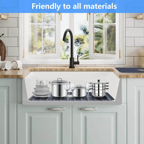 Silicone Kitchen Sink Mat Protector Grid For 12 To 30 Inch Sinks Non Slip Raised Feet Cushioned Protection For Glassware And Stainless Steel Or Ceramic Sinks Gray 26x14 Center in sink with dishes