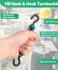 Hand holding 2 Pack M8 Hook and Hook Turnbuckle 304 Stainless Steel Heavy Duty Wire Rope Tensioner with black finish