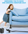 Girl using the Super Easy Heavy Furniture Sliding Kit With Eight Premium Moving Pads And Ergonomic Lifter Tool for sofa adjustment.