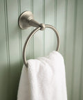 Sage Collection 3 Piece Decorative Bath Hardware Set In Brushed Nickel towel ring, wall-mounted, with white towel in bathroom