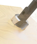 Close-up of Self-Feed Drill Bit 3-Inch, 2-Cutter Wood Boring Bit For Pro-Grade Carpentry drilling into wood with dust.