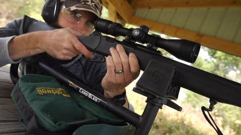 Beefy Durable Water Resistant Lead Sled Weight Bag for outdoor range shooting with dual handles visible in the setup