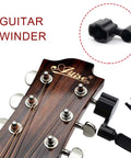 Saphue 3 In 1 Multifunction Guitar String Winder Cutter Pin Puller For Bass And Banjo, ergonomic grip on guitar headstock.