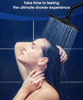 9 Inch Rain Shower Head With 200 Nozzles For Gentle Spa Level Water Flow And High Pressure Performance Large Surface Coverage Tool Free Installation Matte Black Finish EM 001 spraying water in a shower.