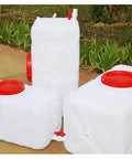Four white 100L Large Capacity Water Storage Tanks with red lids, suitable for schools, hotels, and offices, made from food-grade PE plastic