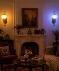 BOKT Battery Operated Light Wall Sconce 2 Pack Wireless Vintage Wall Light illuminating vintage styled room with warm light.