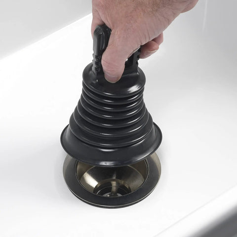 Hand using Must Have Mini Bellows Sink Plunger For Kitchens Bathrooms Baths Laundry Tubs And RVs Compact Powerful Clog Clearing Tool