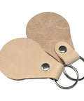 Fresh Veg Tan Leather Key Fobs In A Ten Pack With Pre Assembled Hardware, featuring two fobs with metal rings.