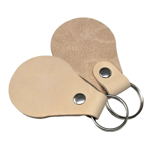 Fresh Veg Tan Leather Key Fobs In A Ten Pack With Pre Assembled Hardware, featuring two fobs with metal rings.