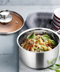 1 Quart Stainless Steel Saucepan With Glass Lid for Easy Cooking filled with pasta, durable small sauce pot shown without lid