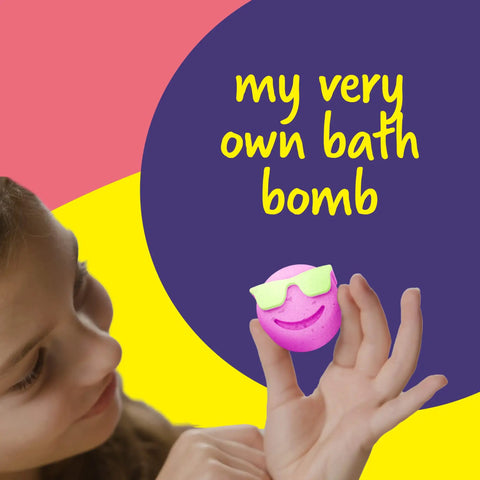 Totally Fun Bath Bomb Making Kit For Kids Turns Bath Time Into A DIY Science Class, Makes 10 Fizzy Bombs With Colorful Molds, Surprises Inside Each Bomb, Easy At Home Spa Project For Creative Play And Mess Free Fun. Girl holding pink bath bomb