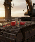 Heavy Duty Hydraulic Quick Connect Coupler Set With Fittings For Construction Gear Ensures Leak Resistant Connection Made From High Strength Steel To Handle Rough Ops Gives Solid Reliability For Your Excavator Loader Hydraulics Where Top Crews Go Hard. on excavator tracks with red dust caps