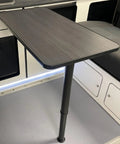 Game Changer Heavy Duty Telescoping Table Slider Leg With Slick Height Adjustments For RVS Campers Boats And Trailers, black adjustable table in compact space.