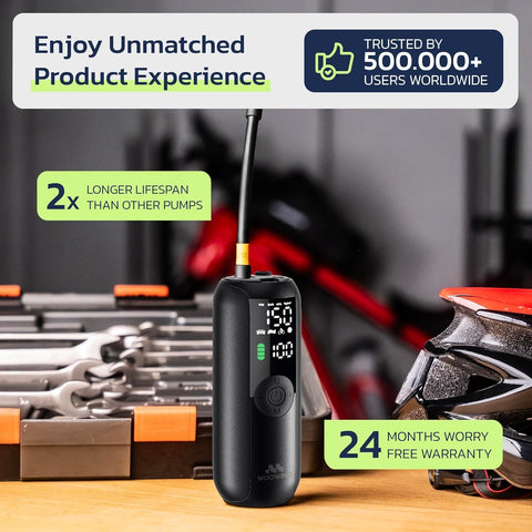 Cordless Bike Pump And Portable Air Compressor With Digital Pressure Gauge 150 PSI Car Tire Inflator on workbench