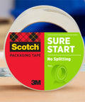 Smooth Operator Clear Shipping Packing Tape With Heavy Duty Dispenser For Quick Box Sealing And Fast Rollout In Bulk Six Pack Supply For Straight Ahead Warehouse Jobs on a wooden surface.