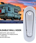 Rock Solid Heavy Duty Folding Coat Hooks Black Aluminum Wall Hangers For Bathrooms And Bedrooms mounted on RV wall.