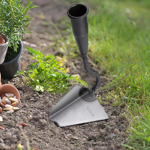 Triangle Hoe Digger Garden Tool Set For Weeding, Planting, And Ditch Digging in garden soil, focus on iron head.