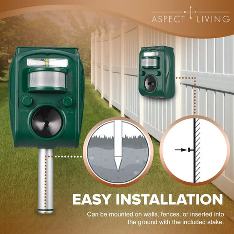 Outdoor Ultrasonic Pest Repeller With Motion Sensor And LED Strobe Lights, installed on a white fence, shown with ground stake