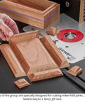7 Piece 90 Degree V Groove Router Bit Set Featuring Premium Carbide Cutters In Quarter And Half Inch Shanks for creating miter-fold joints on wood.