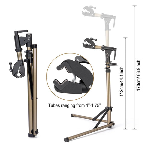 Heavy Duty Bike Repair Stand with 360 Degree Rotating Clamp holds 1 to 1.75 in tubes, shown with adjustable height and folding legs.