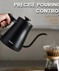 Gooseneck Electric Kettle With 304 Stainless Steel Build Auto Shutoff And Anti Dry Protection For Pour Over Coffee And Tea Matte Black 1.0L 1200W Fast Boil No Plastic Contact BPA Free being used to pour water into a coffee dripper