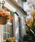 Telescoping Watering Wand For Garden Hose 36 To 54 Inch Adjustable Reach used on hanging basket of flowers