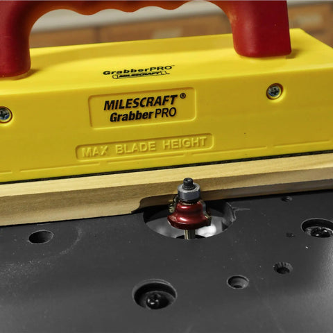 GrabberPRO LITE Push Block For Table Saws And Router Tables With Adjustable One Inch Leg And Reversible Legs in use on router.