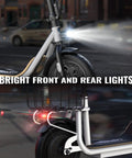 Peak 800W Electric Scooter With Seat For Adults showing bright front and rear lights at night setting