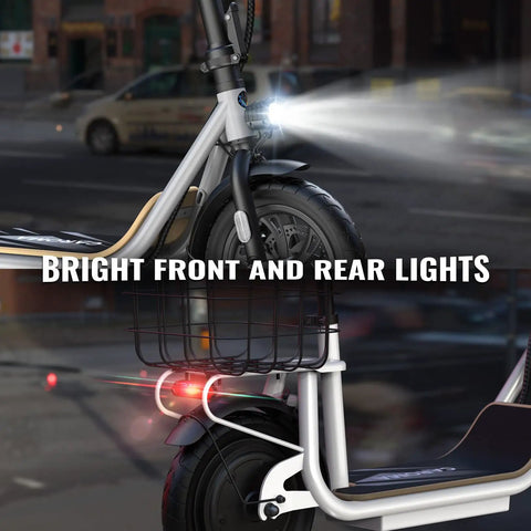 Peak 800W Electric Scooter With Seat For Adults showing bright front and rear lights at night setting