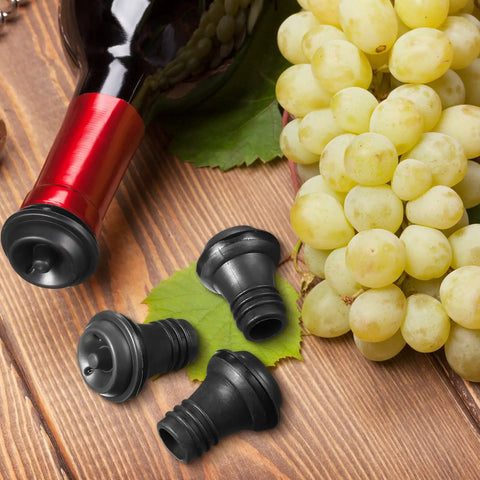 24 Piece Wine Stopper Set With Vacuum Pump And Silicone Saver Keeps Wine Fresh Sealed And Flavorful near grapes on wooden surface