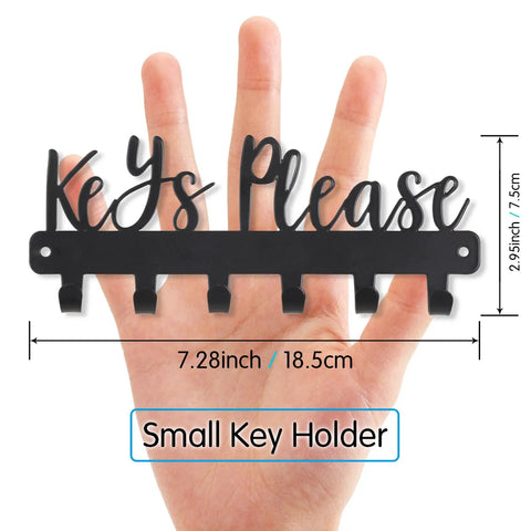 Keys Please Wall Mounted Mini Key Holder Iron Black Decor Rack With Six Hooks displayed against a hand for size reference.