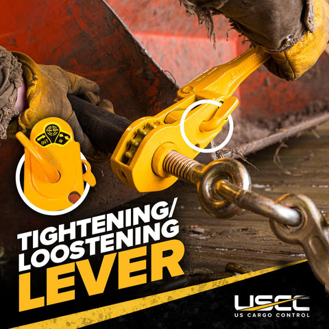 QuikBinder Plus Ratchet Load Binder For Grade 70 And Grade 80 Chain Five Sixteenths To Three Eighths Inch With Folding Handle And 7100 Lbs Working Load Limit Heavy Duty Chain Binder For Secure Trailers Equipment And Towing, shown with tightening and loosening lever on a flatbed.