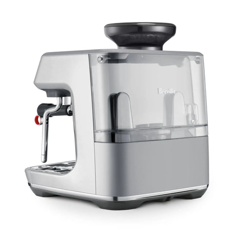 Certified Remanufactured Automatic Espresso Machine With Built In Grinder And Steam Wand Knocking Out Next Level Cafe Brews At Home, sleek silver design with transparent water reservoir.