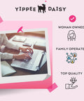 Woman typing on laptop at desk, Yippee Daisy brand, highlighting woman-owned, family-operated, top quality features.