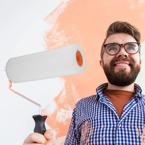 Pro Touch Paint Roller Replacement Sponge Head For Interior Walls And Baseboards White Plastic Compact Brush held by smiling man.