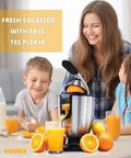 Eurolux Premium Electric Orange Juicer Featuring 160W High-Torque Motor for easy juicing with stainless steel design, in family setting.